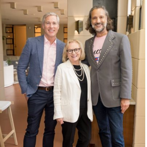 Three people representing donors